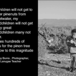 Young girl standing in a field.