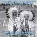 Two Native American warriors in traditional dress.