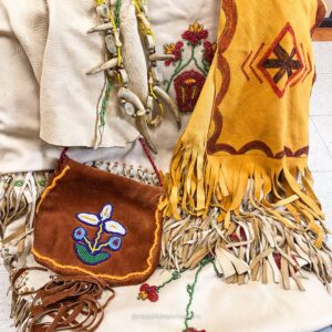 Beaded Native American leather bag and shawl.